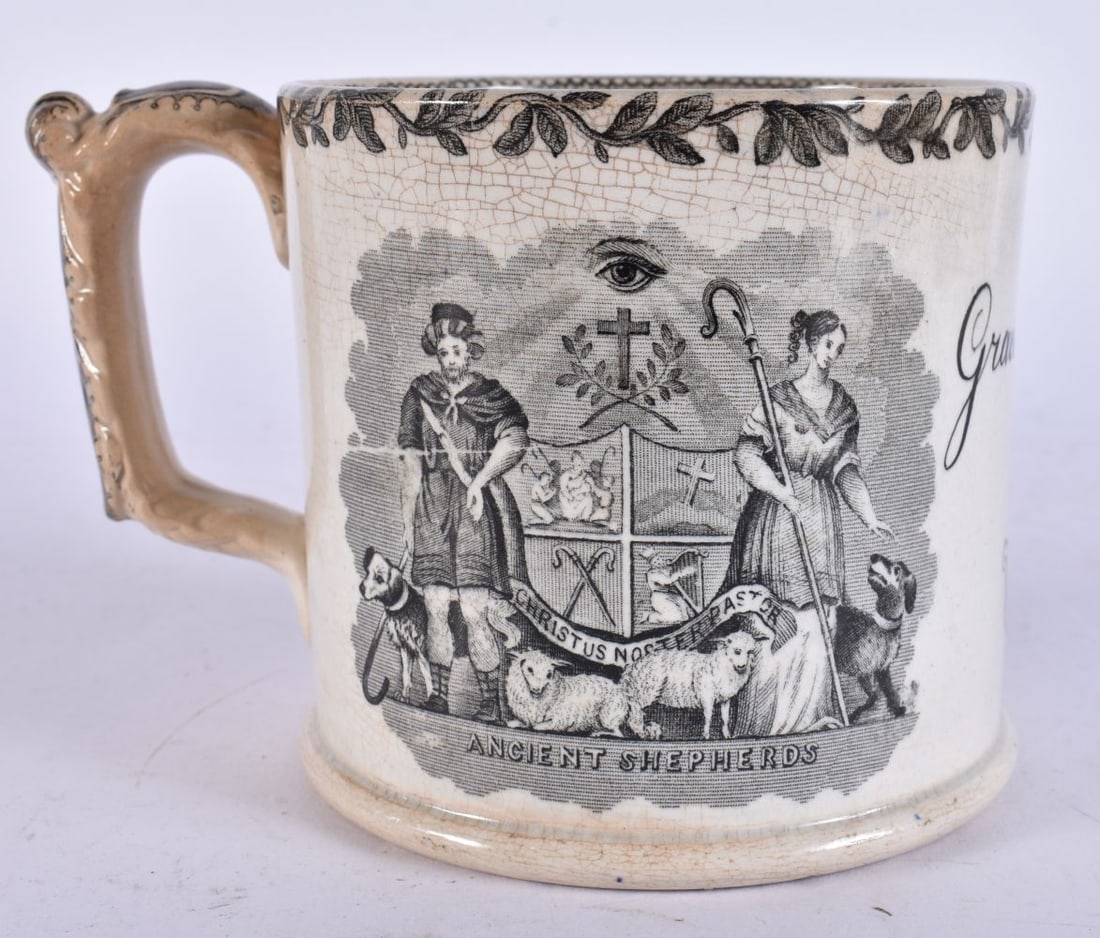 A MID 19TH CENTURY ENGLISH BLACK AND WHITE POTTERY MUG. 15 cm wide. (1 of 6)