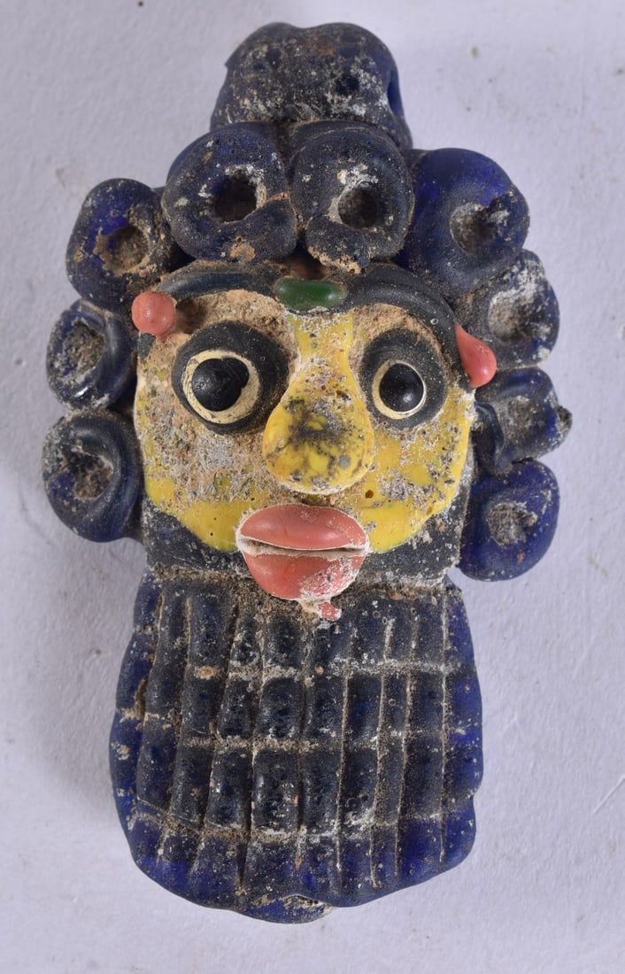 A PHONETIAN GLASS BEAD possibly antiquity. 9.5 cm x 4.5 cm. (1 of 4)