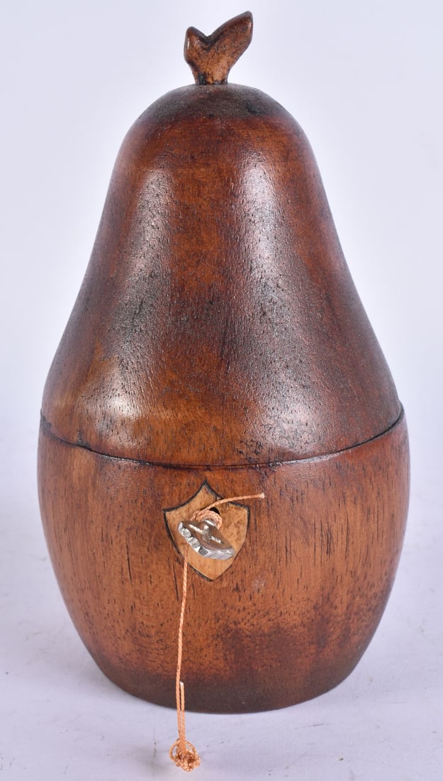 A TREEN WOOD TEA CADDY. 19 cm high. (1 of 5)