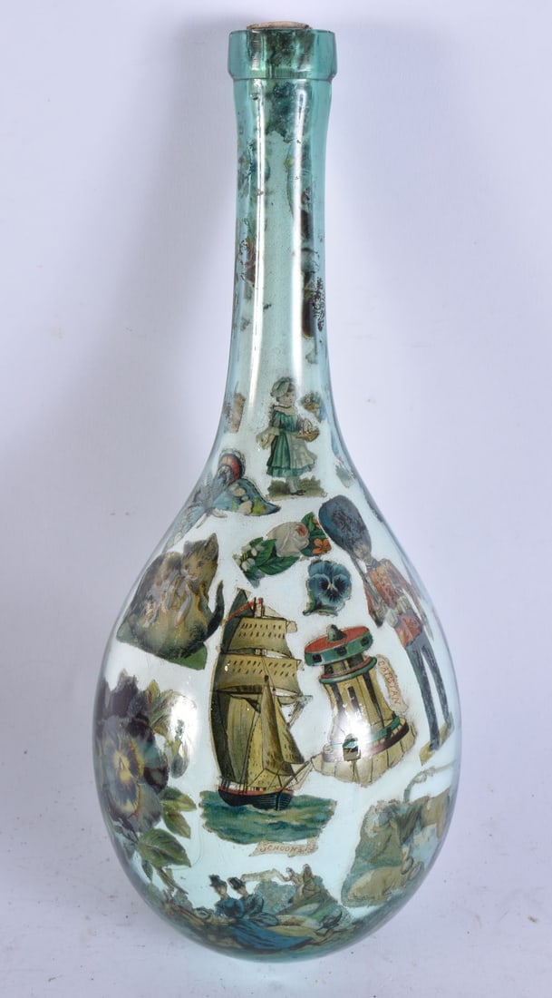 A DECLOMANIA GLASS BOTTLE. 26 cm long.: A DECLOMANIA GLASS BOTTLE. 26 cm long.