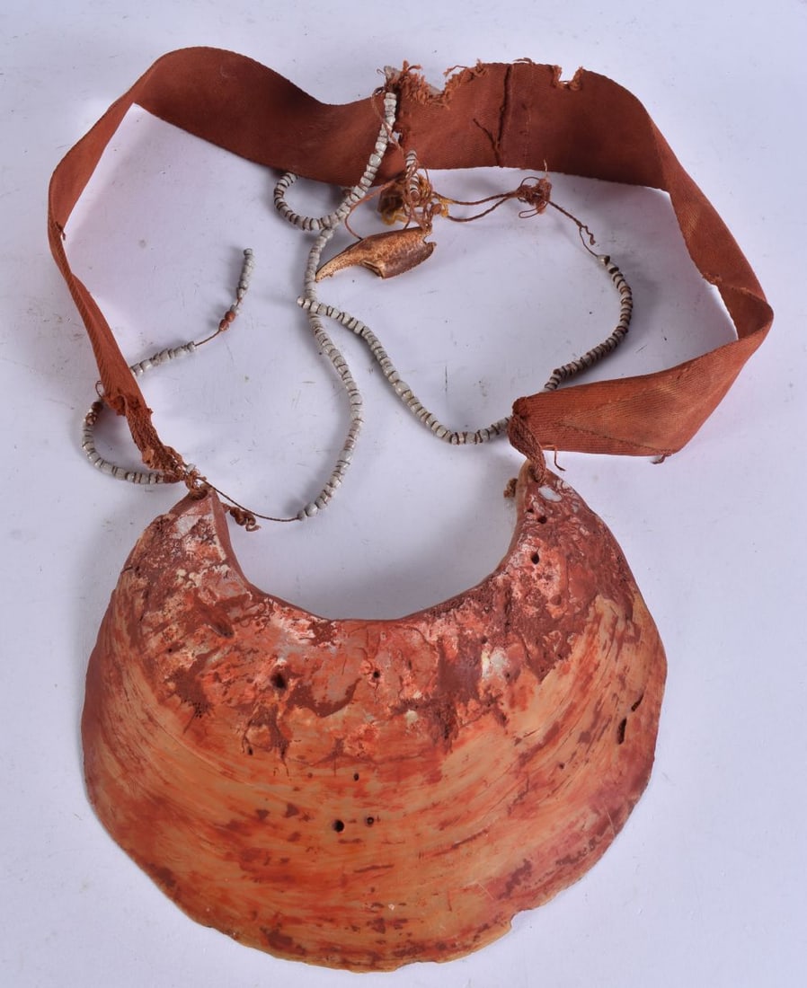 A PAPUA NEW GUINEA TRIBAL SHELL CURRENCY NECKLACE. Shell 24 cm x 18 cm. (1 of 5)