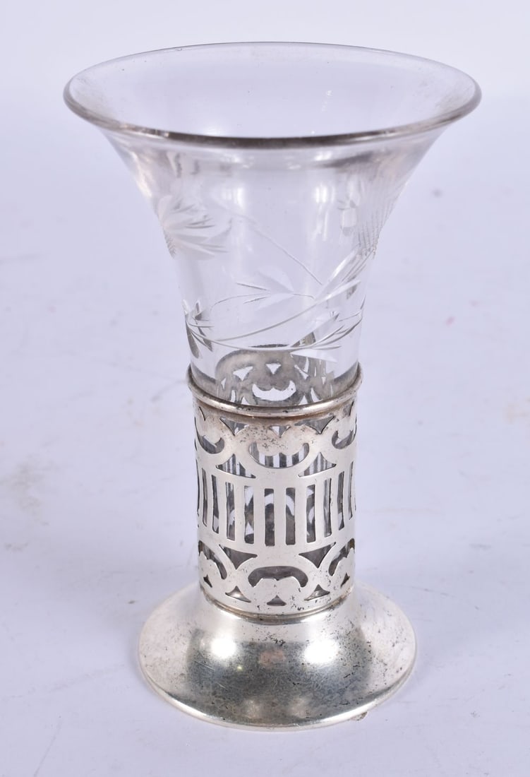 A SILVER AND CUT GLASS VASE. 115 grams overall. 10.75 cm x 6.75 cm. (1 of 4)