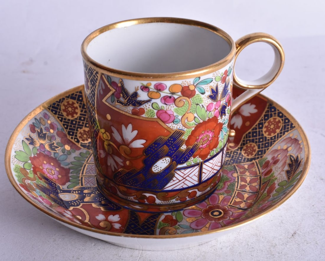 Early 19th century Worcester Barr Flight and Barr imari coffee can and saucer with central initial J: Early 19th century Worcester Barr Flight and Barr imari coffee can and saucer with central initial J in gold. 13cm diameter (2)