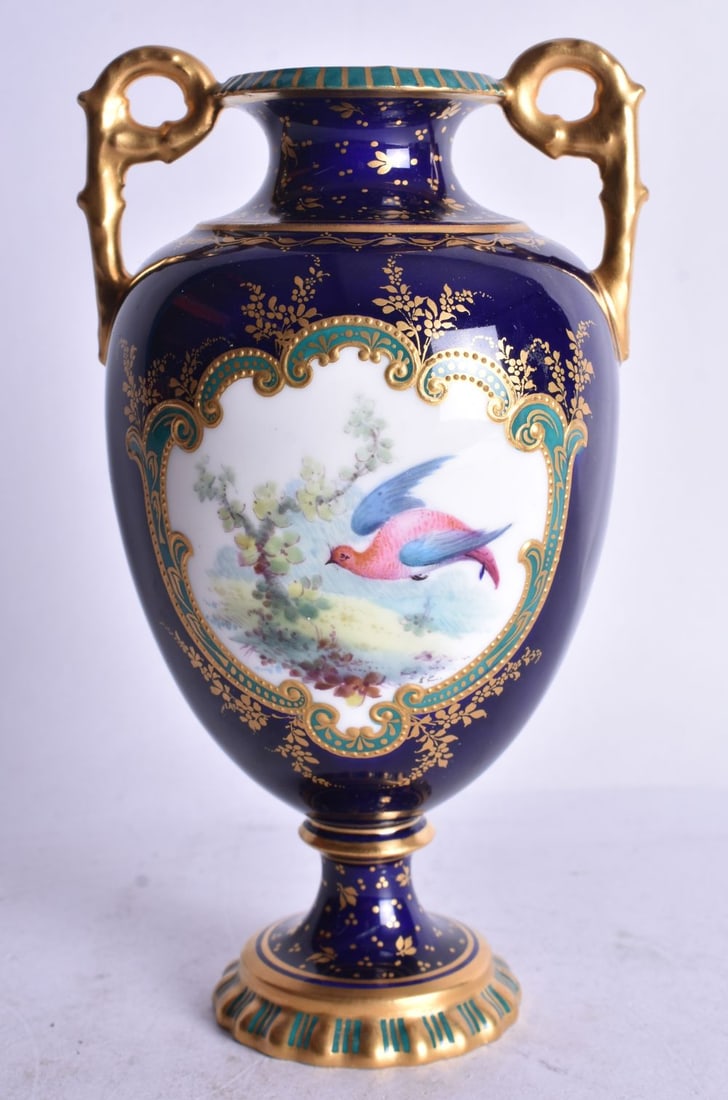 Royal Crown Derby two handle vase with blue and gilt ground painted with a flying bird in landscape (1 of 3)