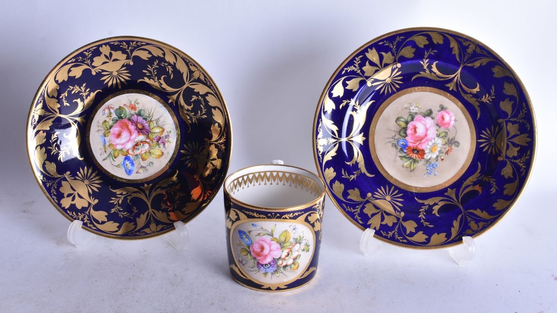 Derby coffee can, saucer and side plate painted with flowers c. 1900, all three signed W. Moseley. L (1 of 2)