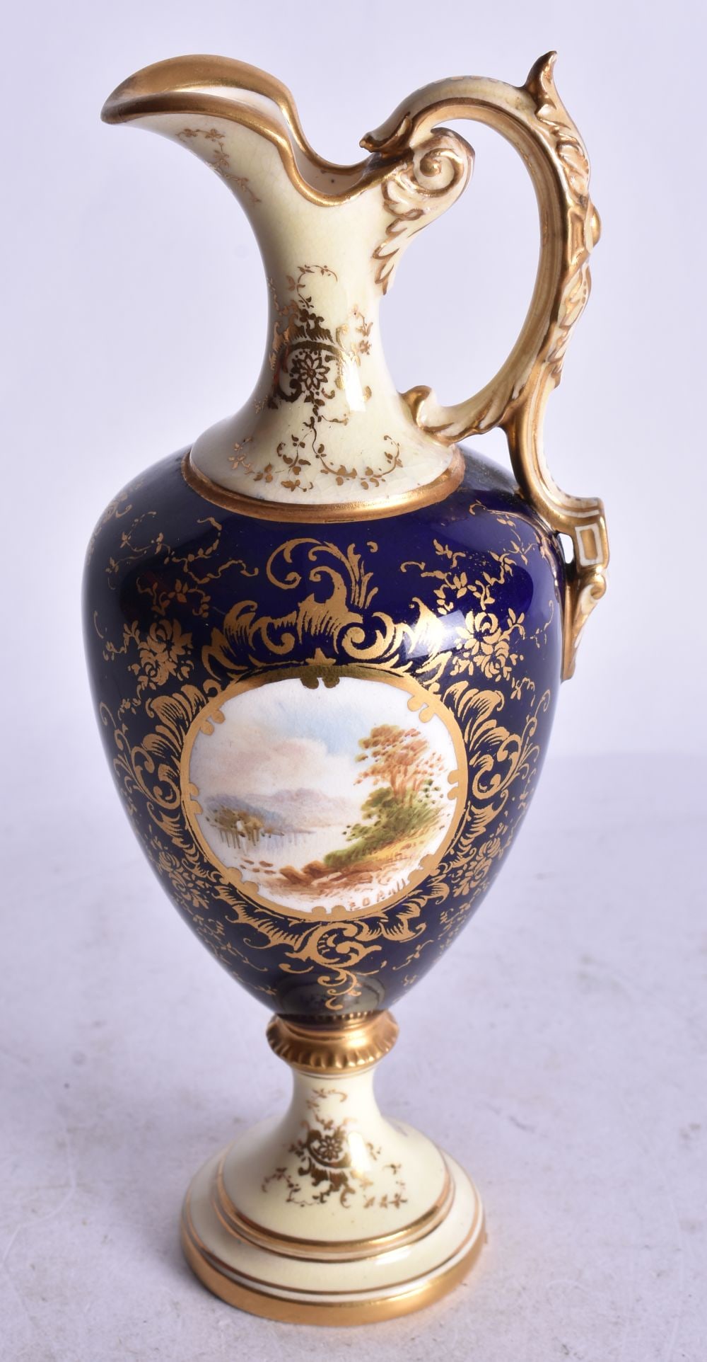 Early 20th century Coalport pedestal ewer painted with a Scottish loch , green mark.19cm height (1 of 3)