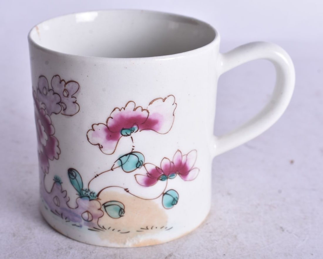 Early 18th century Bow coffee can painted with coloured flowers in famille rose style. 6cm height: Early 18th century Bow coffee can painted with coloured flowers in famille rose style. 6cm height