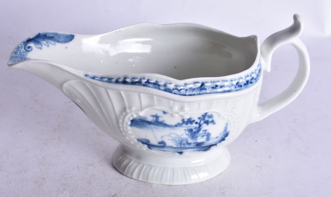 18th century Worcester moulded sauceboat painted with two blue and white two landscapes, including F (1 of 4)
