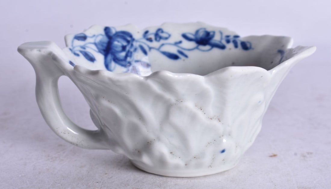 18th century Worcester moulded geranium butterboat painted with blue and white flowers, workman?s ma (1 of 3)
