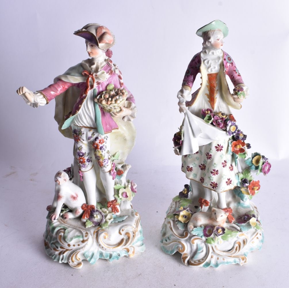 18th century Derby fine pair of figures of a shepherd and shepherdess on a rococo base her with a do (1 of 3)