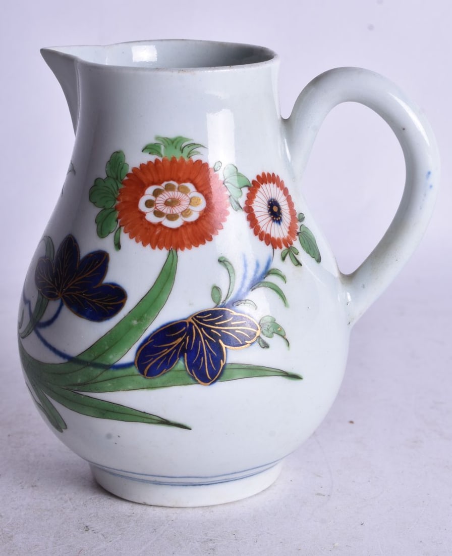 18th century Worcester cream jug with beak shaped spout painted with the Kempthorne pattern. 10 cm h (1 of 3)