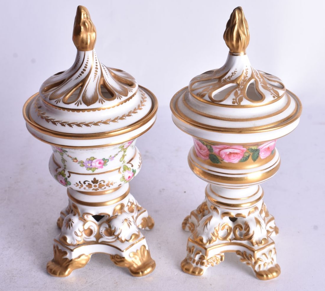 Early 20th century Derby four footed pot pourri vase and cover painted with roses on a gold ground, (1 of 3)
