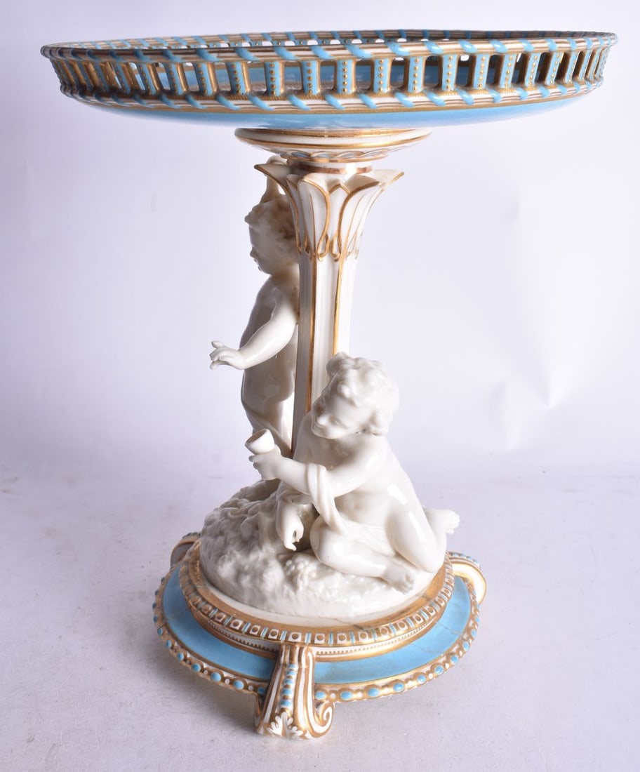 19th century Minton comport with pierce border, the base with cherubs, cracks to base, loss to finge (1 of 4)