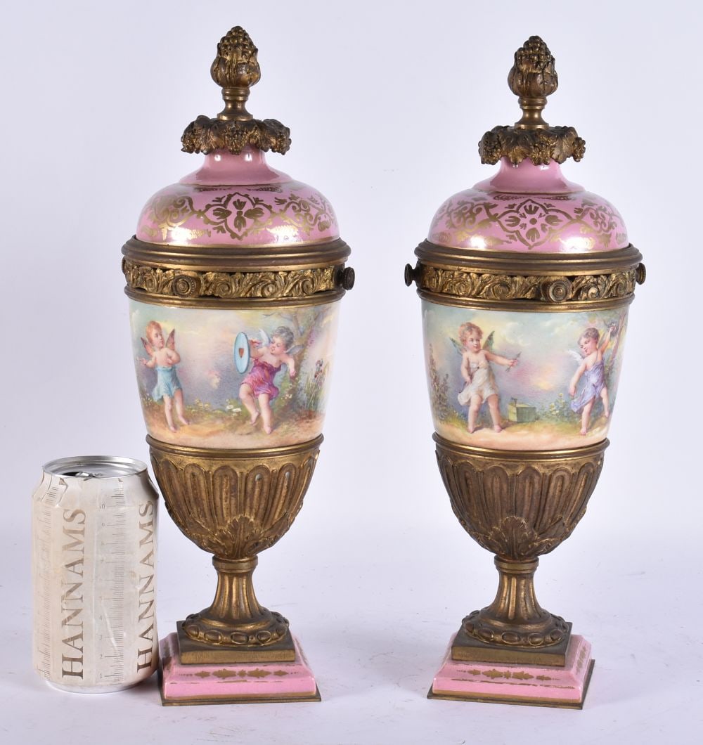 A PAIR OF 19TH CENTURY FRENCH PORCELAIN BRONZE URNS AND COVERS. 33 cm high. (1 of 5)