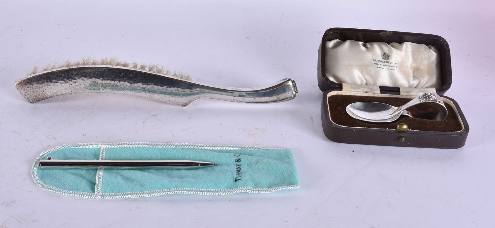 A TIFFANY & CO PEN together with a silver spoon. and a plated brush. Silver 22 grams. (3) (1 of 7)