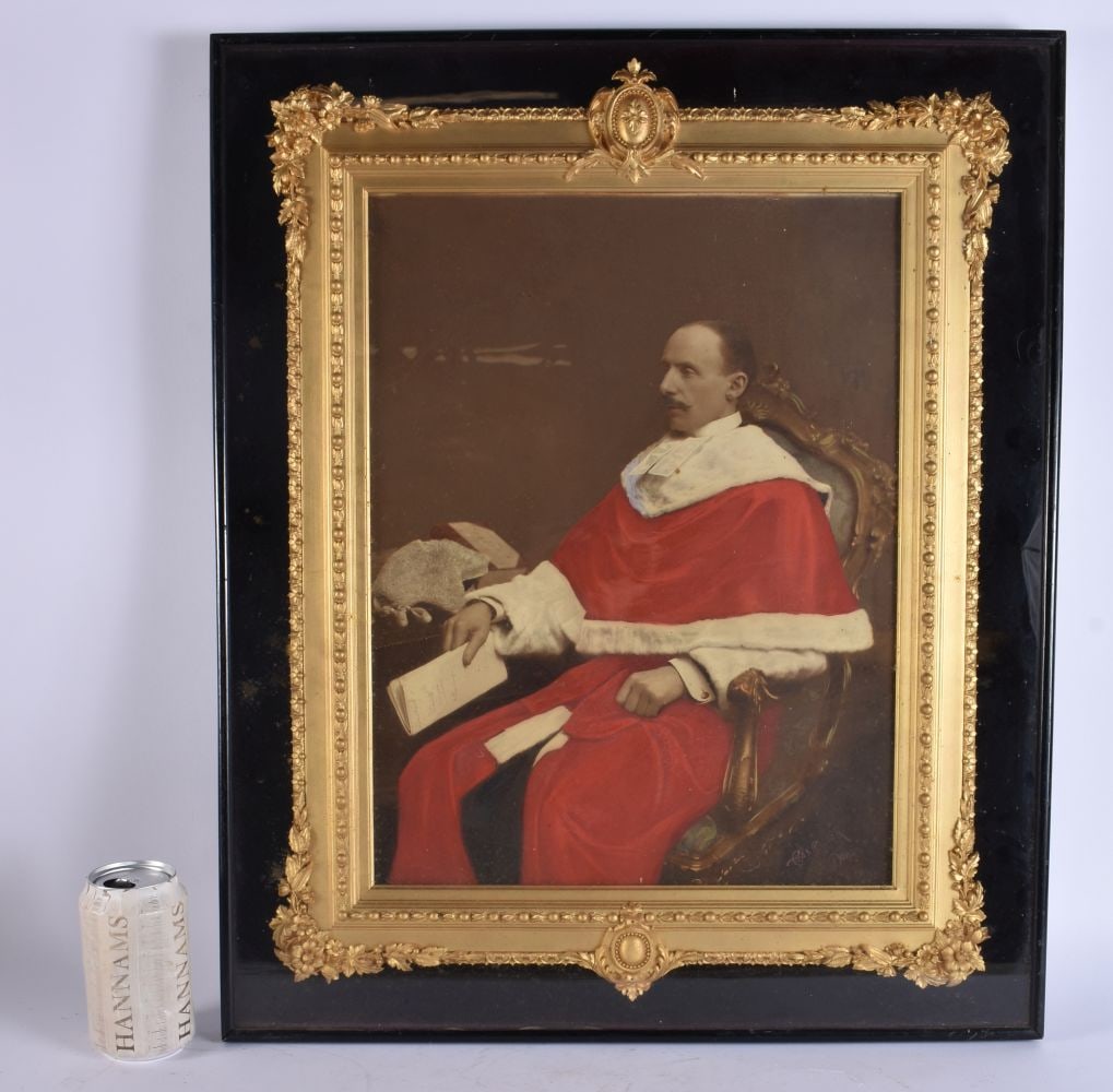 A VICTORIAN HAND COLOURED PHOTOGRAPH OF A MALE within a decorative giltwood frame. 62 cm x 52 cm. (1 of 4)