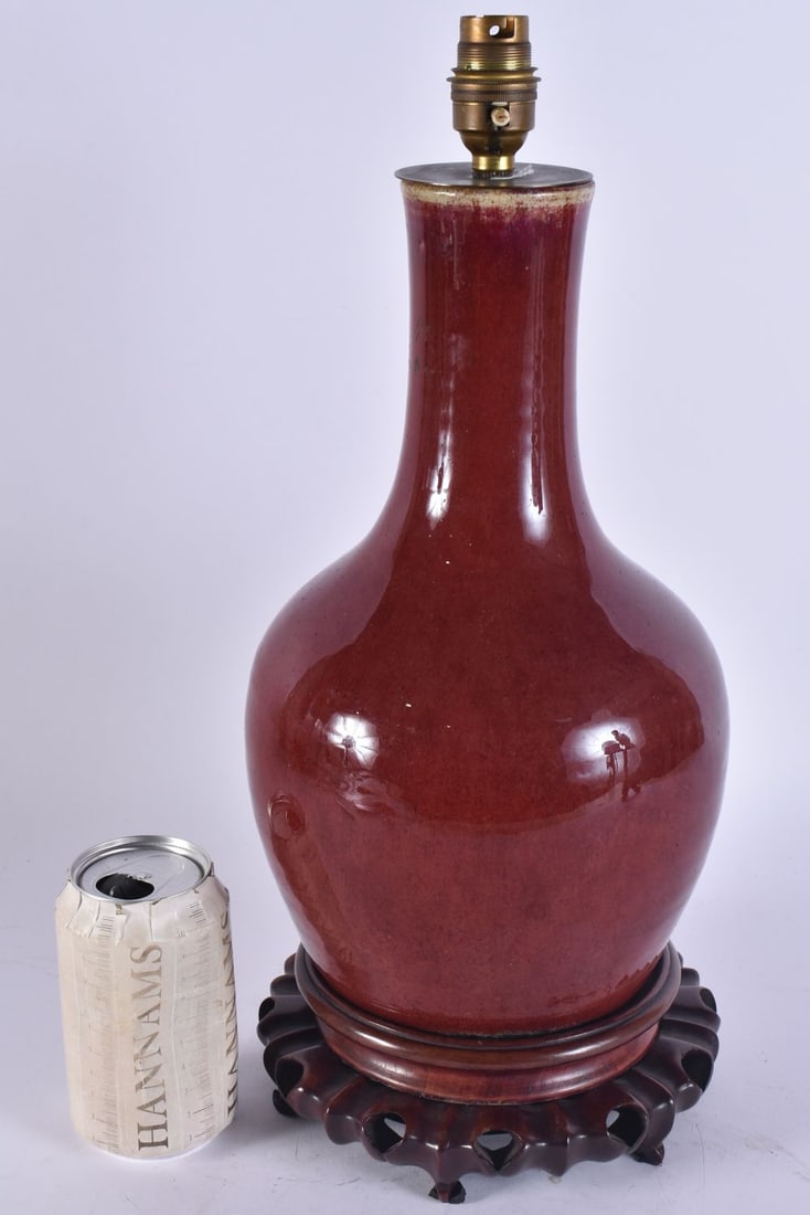 A LARGE 18TH/19TH CENTURY CHINESE SANG DU BOEUF BULBOUS VASE Late Qianlong/Jiaqing. 42 cm high. (1 of 3)