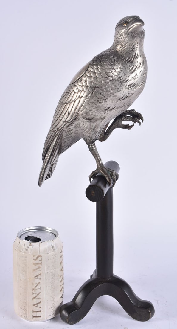 A 19TH CENTURY JAPANESE MEIJI PERIOD SILVERED BRONZE HAWK KORO ON PERCH. 39 cm high. (1 of 3)