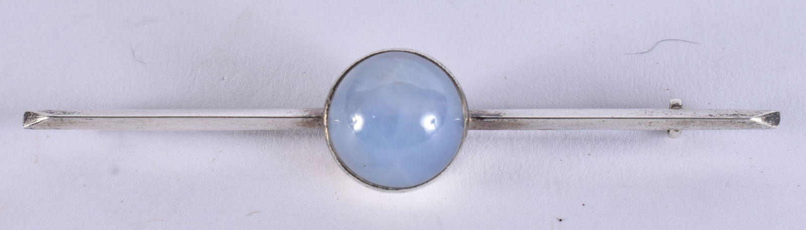 AN ART DECO MOONSTONE BROOCH. 11.5 grams. 8.5 cm wide. (1 of 3)