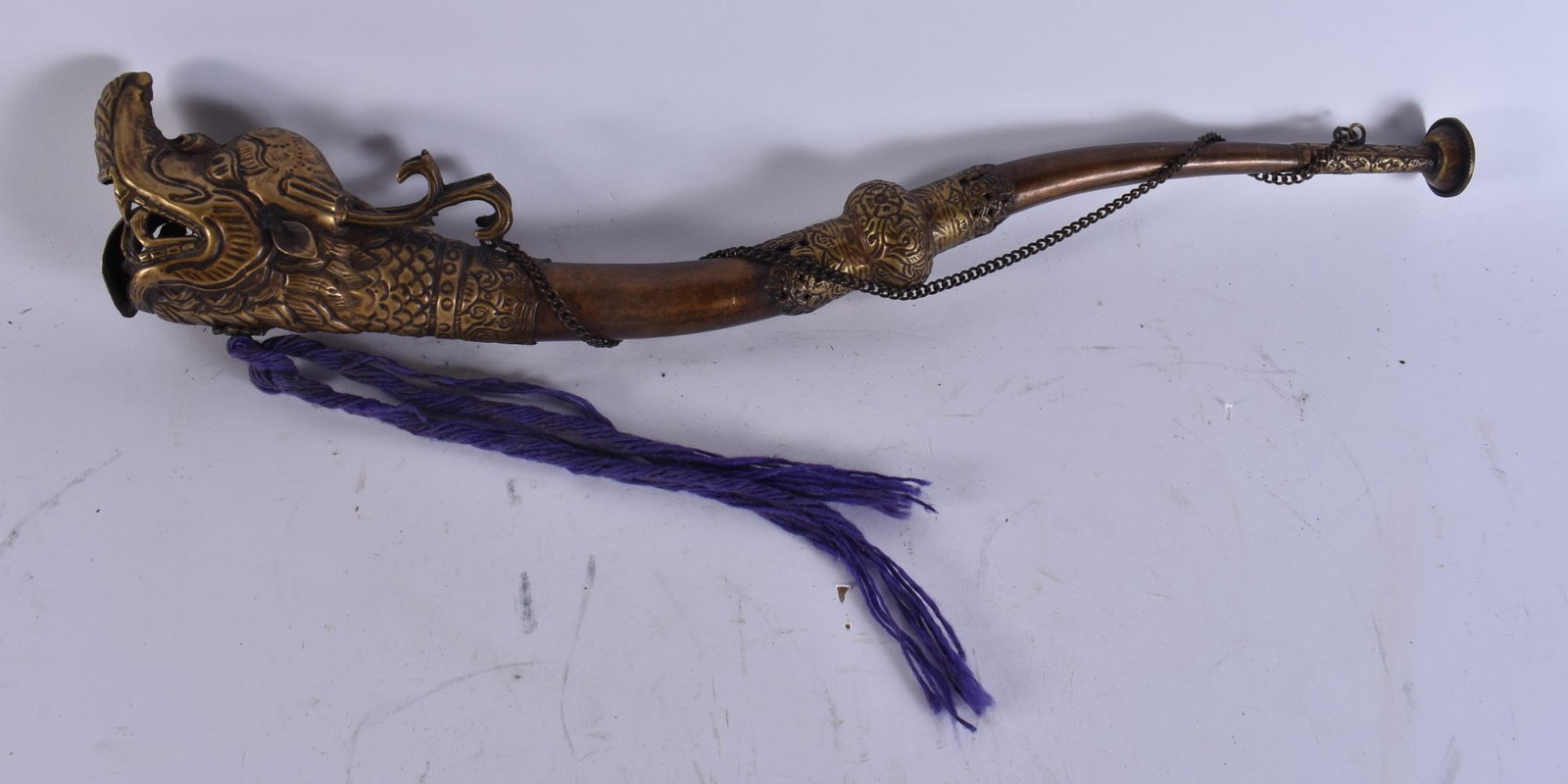 A 19TH CENTURY TIBETAN REPOUSSE COPPER BEAST HORN. 50 cm long. (1 of 6)