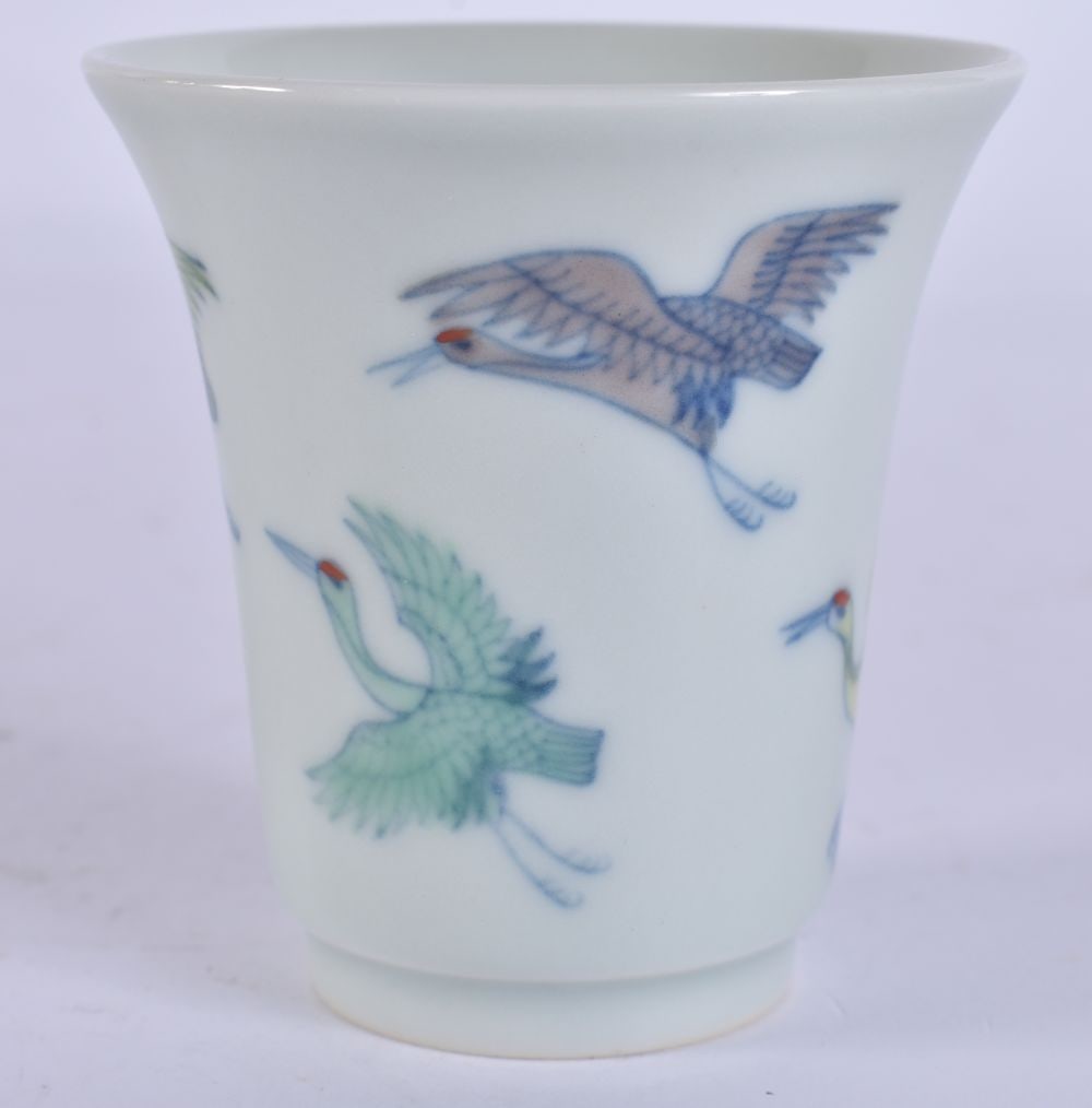 A CHINESE DOUCAI PORCELAIN WINE CUP. 6.5 cm high.: A CHINESE DOUCAI PORCELAIN WINE CUP. 6.5 cm high.