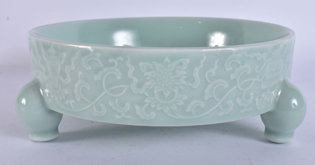 A CHINESE CELADON RAISED RELIEF DECORATED PORCELAIN CENSER. 18 cm wide. (1 of 6)