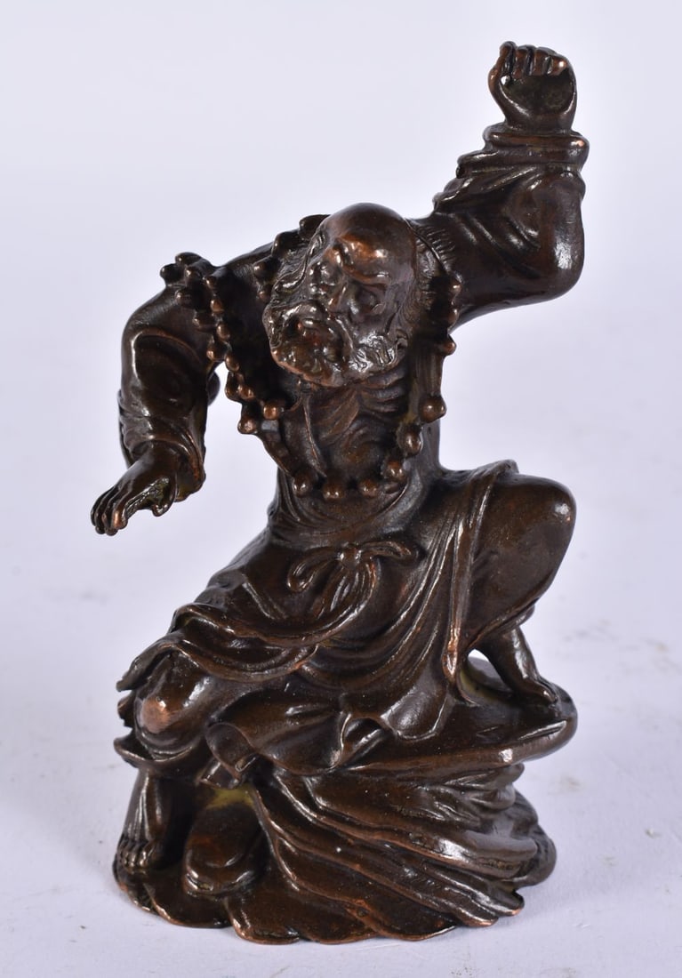 A JAPANESE BRONZE GOD. 444 grams. 11.5 cm high. (1 of 3)