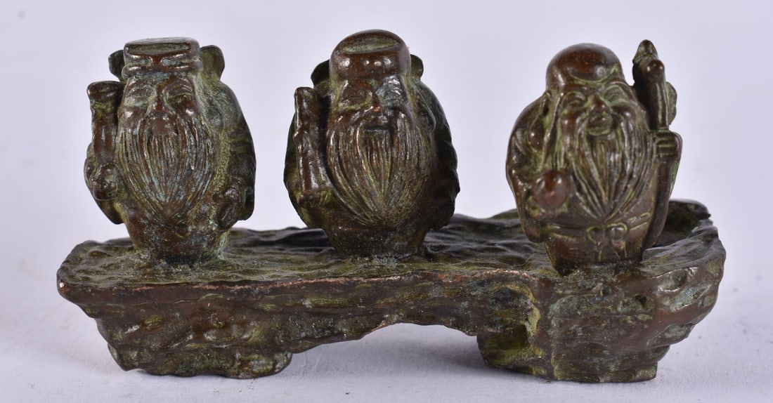 THREE JAPANESE BRONZE GODS. 211 grams. 4.25 cm x 3.5 cm. (1 of 3)