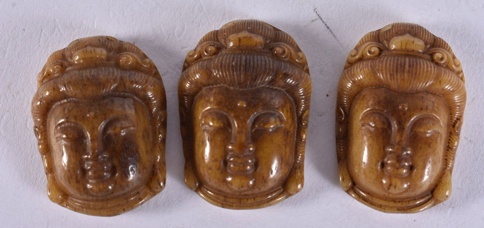 THREE CHINESE HORN PLAQUES. 27.7 grams. 3.5 cm x 2.25 cm. (3) (1 of 3)