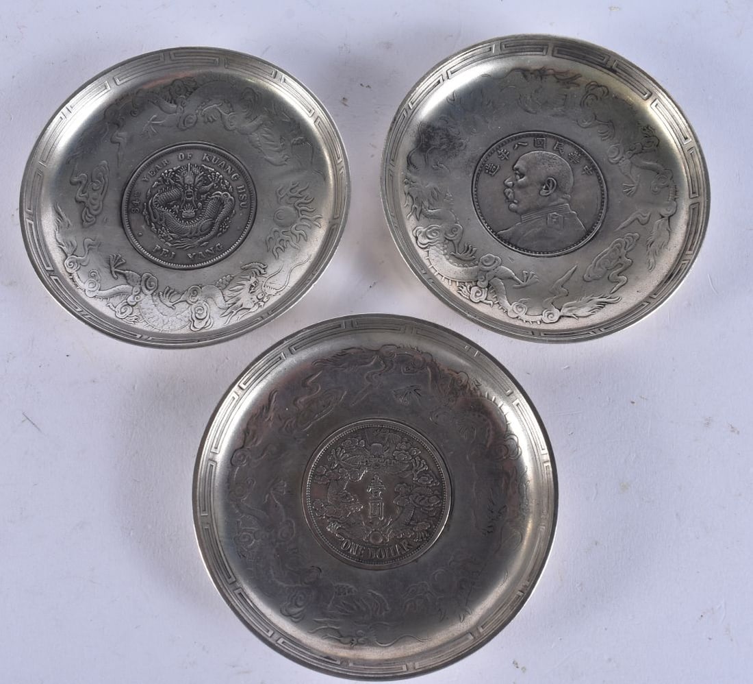 THREE CHINESE WHITE METAL COIN DISHES. 332.3 grams. 9.25 cm wide. (3) (1 of 5)