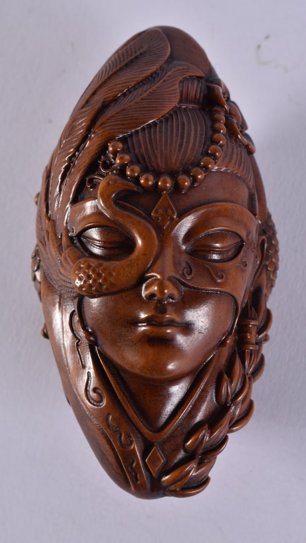 A JAPANESE WOOD BEAD. 51.5 grams. 8 cm x 4 cm.: A JAPANESE WOOD BEAD. 51.5 grams. 8 cm x 4 cm.