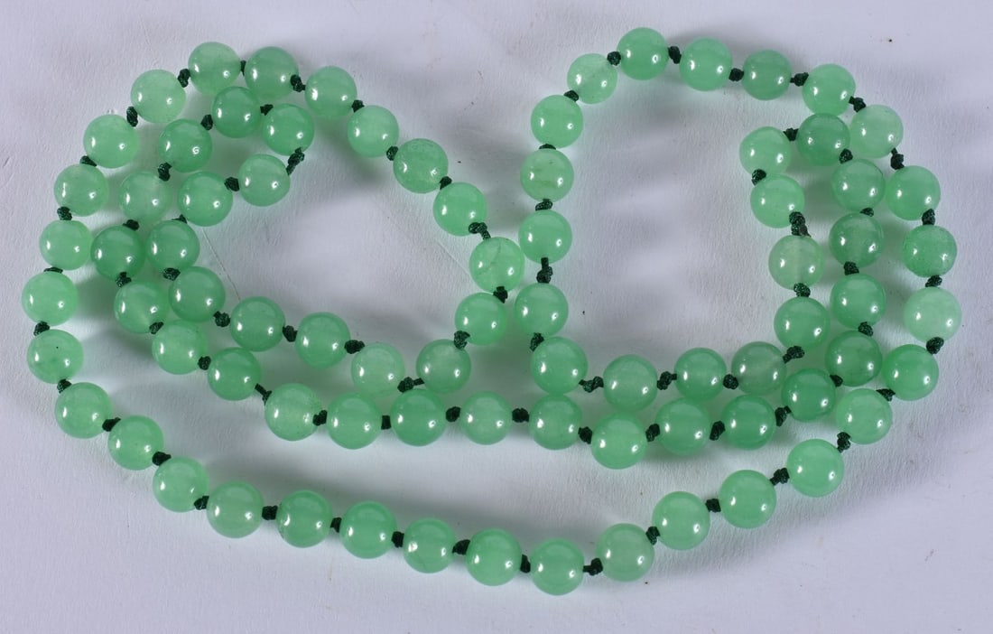 A CHINESE JADE NECKLACE. 58 grams. 78 cm long. (1 of 3)