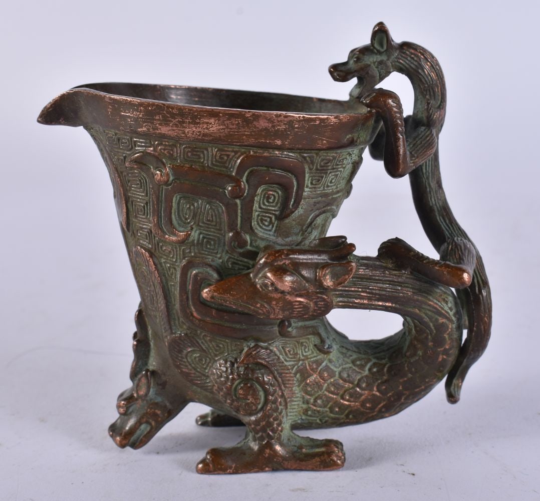A CHINESE BRONZE LIBATION CUP. 367 grams. 8.5 cm x 8.5 cm. (1 of 5)