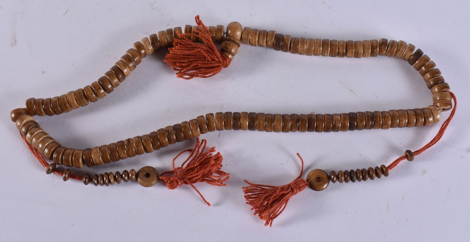 A TIBETAN NECKLACE. 84 grams. 52 cm long. (1 of 3)