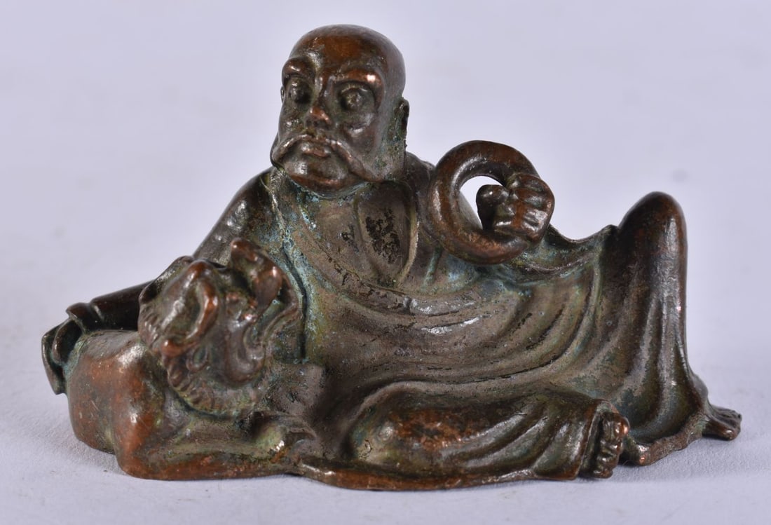 A BRONZE BUDDHA. 130 grams. 6.5 cm x 3.5 cm. (1 of 3)