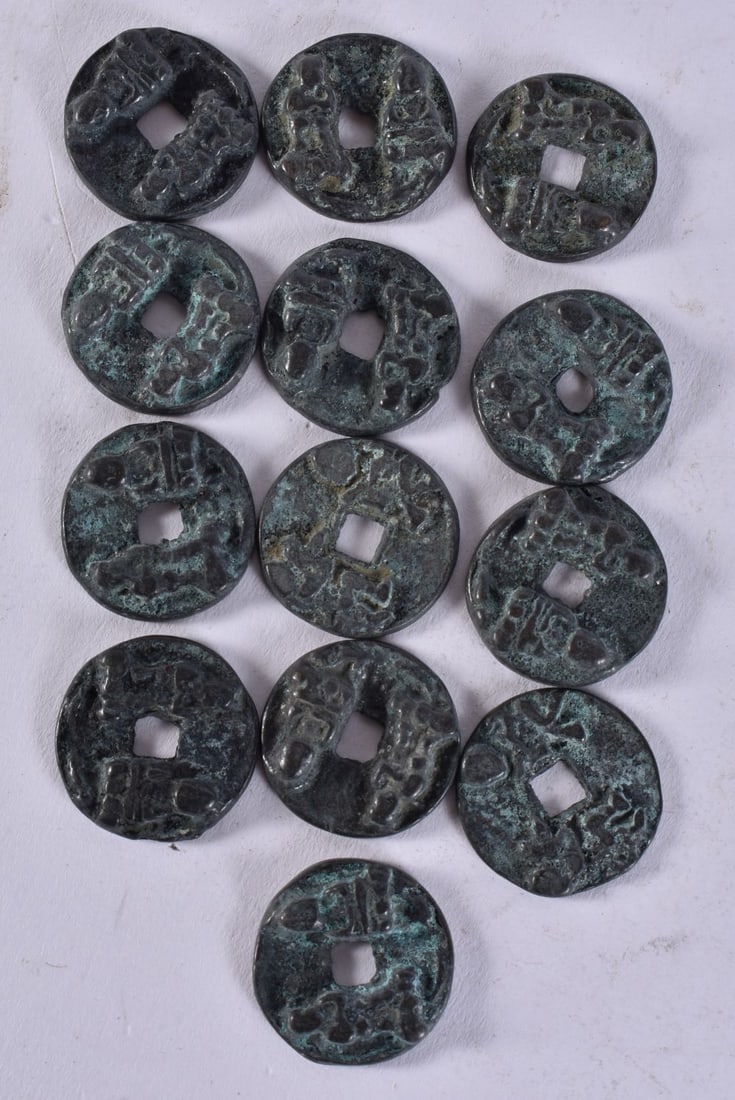 CHINESE TOKENS. 97.4 grams. 2.25 cm wide. (1 of 3)