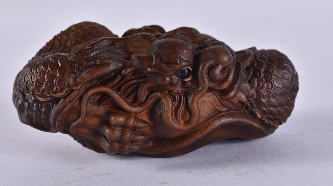 A JAPANESE CARVED DRAGON. 45 grams. 7.75 cm x 4.5 cm. (1 of 4)