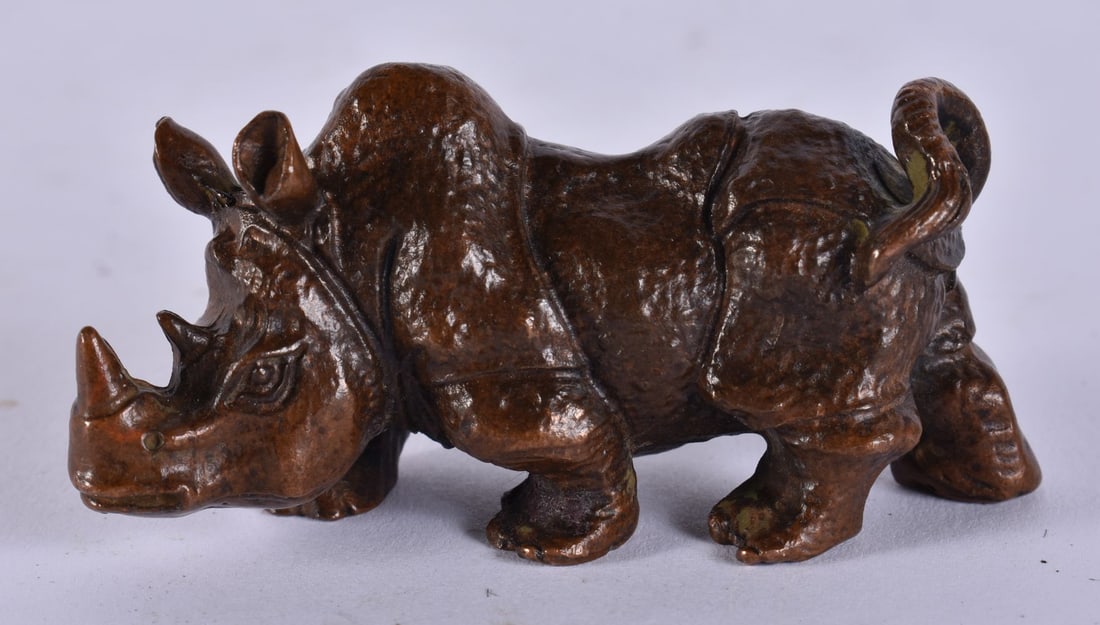 A JAPANESE BRONZE RHINO. 231.8 grams. 7.5 cm x 3.5 cm. (1 of 3)