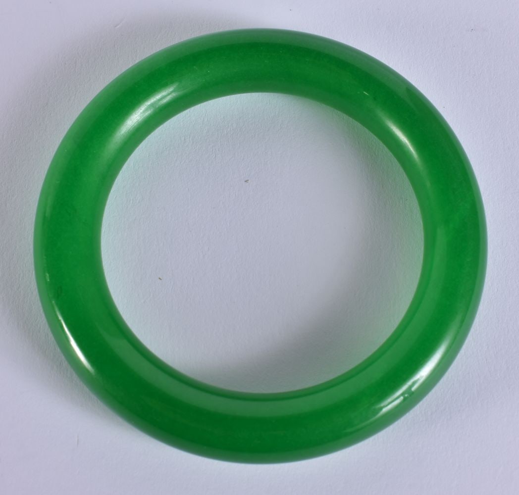 A CHINESE JADE BANGLE. 75 grams. 18.5 cm wide. (1 of 3)