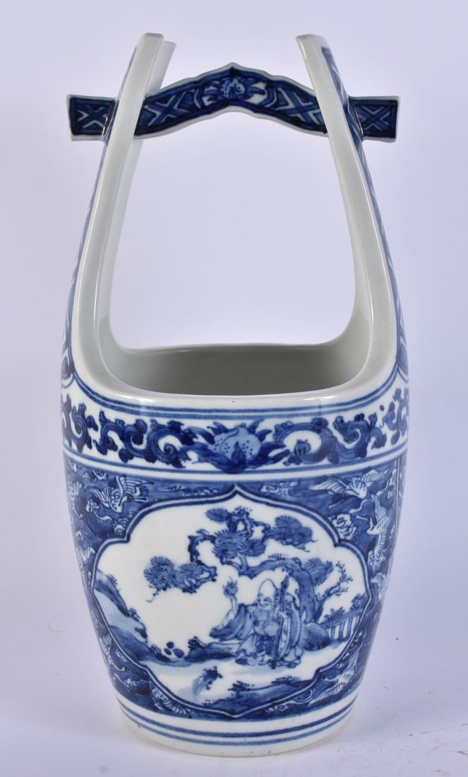 A JAPANESE BLUE AND WHITE PORCELAIN BASKET. 32 cm high. (1 of 4)