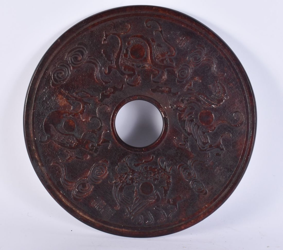 A LARGE CHINESE STONE BI DISC. 29 cm wide. (1 of 3)