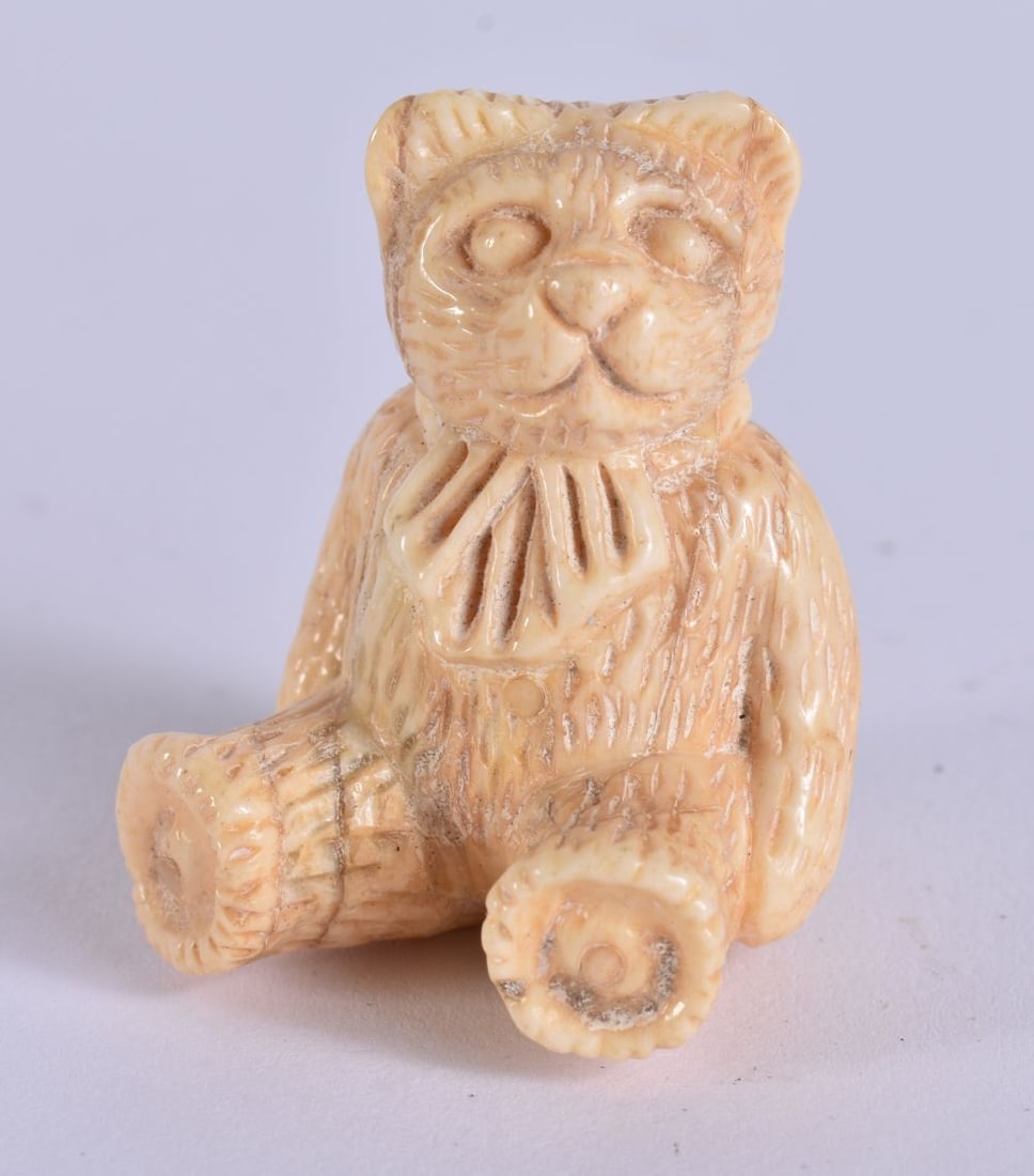 A JAPANESE BONE TEDDY BEAR. 35 grams. 4.5 cm x 3.5 cm. (1 of 3)