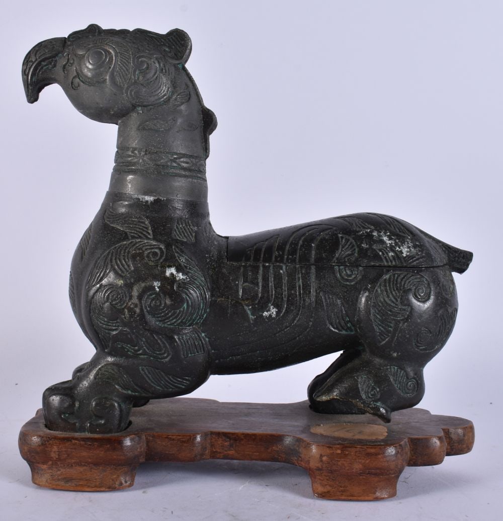 A CHINESE BRONZE BEAST CENSER. 21 cm x 23 cm. (1 of 3)