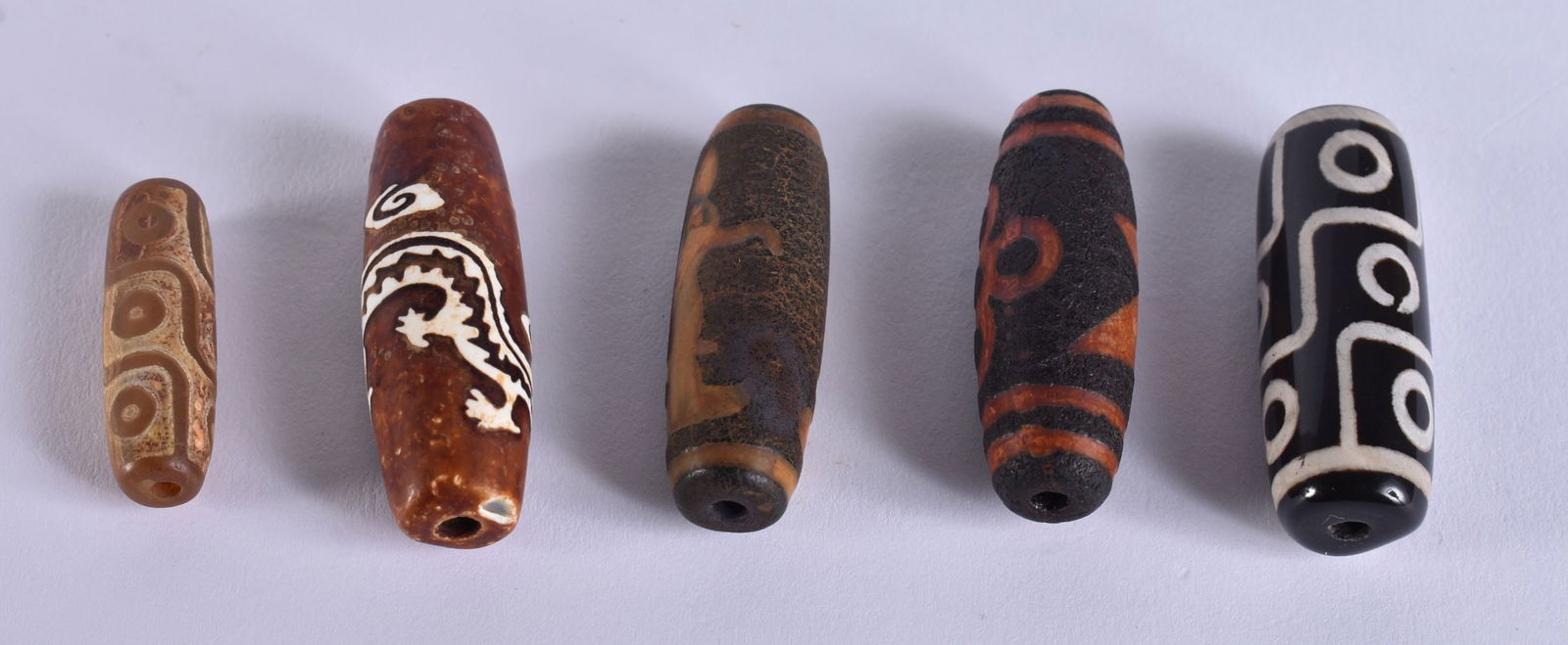 FIVE TIBETAN ZHU BEADS. 51 grams. 4 cm wide. (5) (1 of 3)