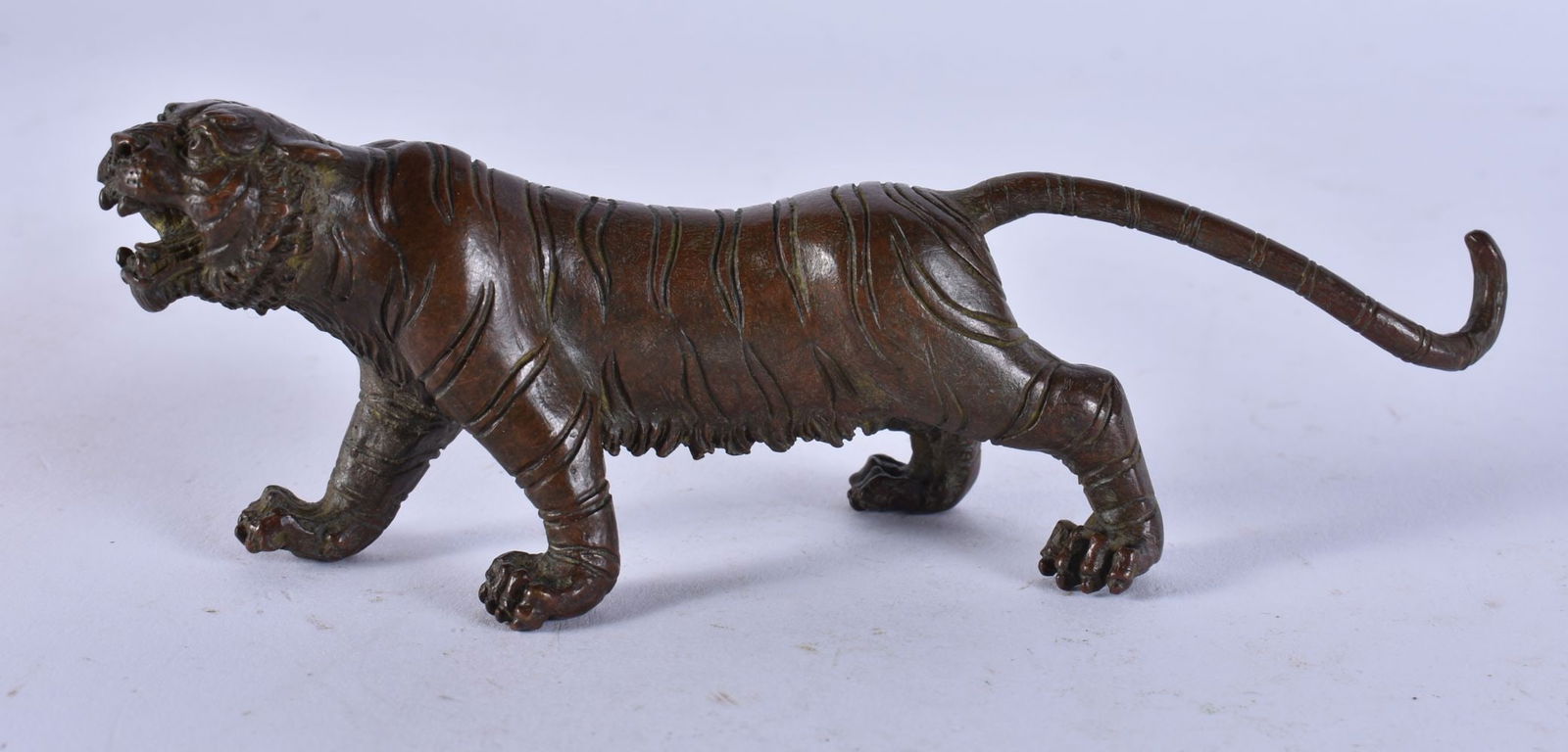 A JAPANESE BRONZE TIGER. 298 grams. 14 cm wide. (1 of 3)