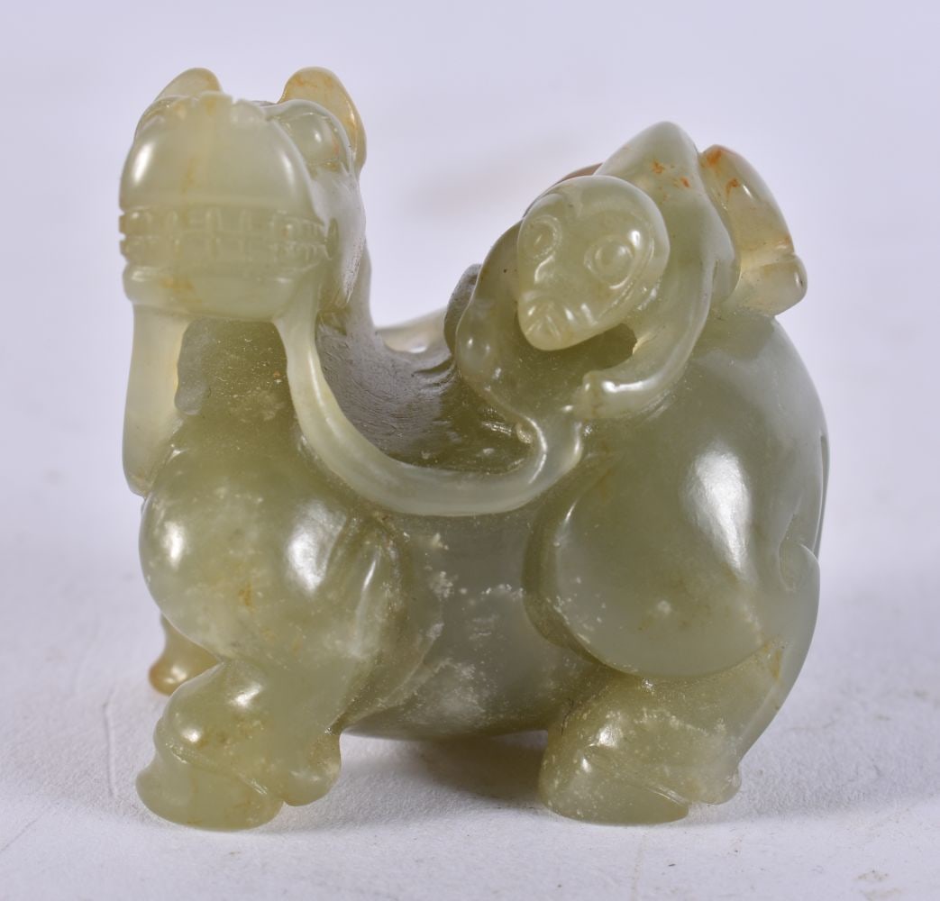 A CHINESE JADE BEAD. 85.1 grams. 4.25 cm x 4 cm. (1 of 5)