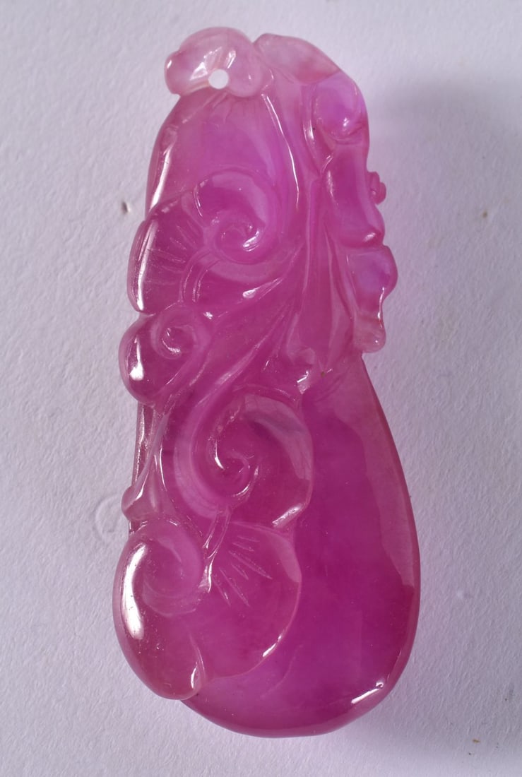 A CHINESE PINK TOURMALINE PLAQUE. 34.4 grams. 6.25 cm x 2.5 cm. (1 of 2)