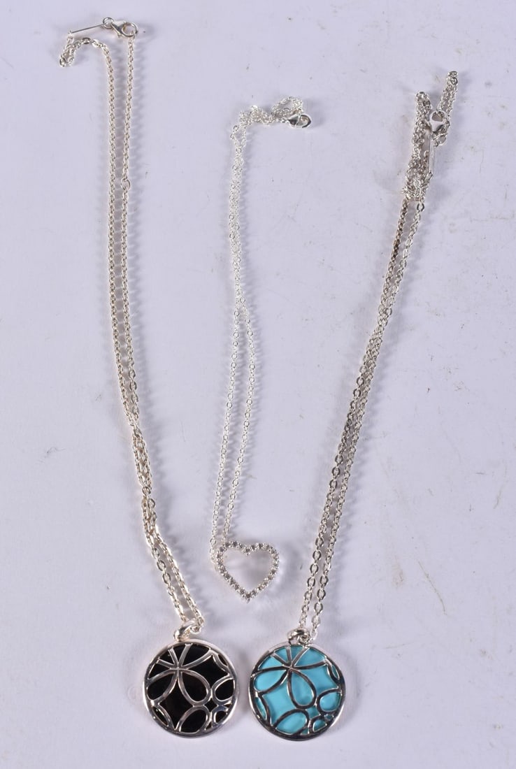 TWO SILVER NECKLACES. 50 cm long. (2) (1 of 3)