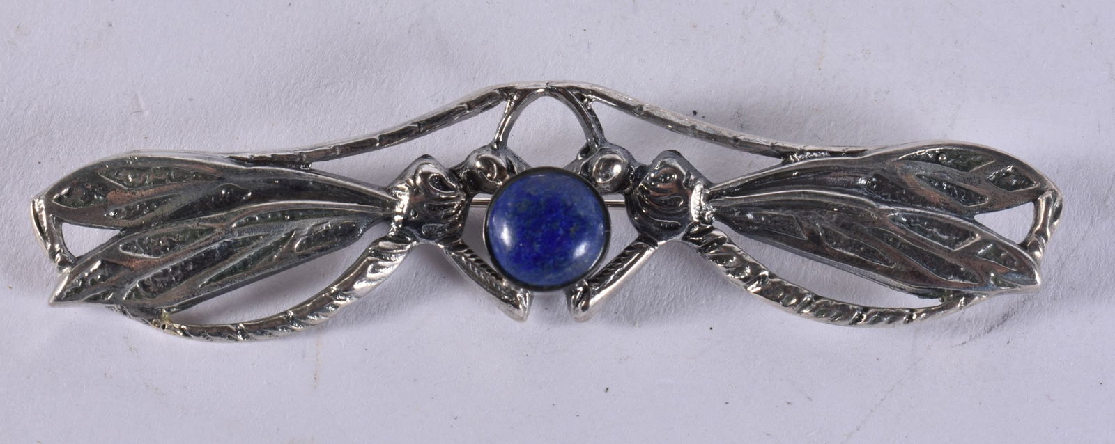 A SILVER AND LAPIS DRAGONFLY BROOCH. 16 grams. 9 cm wide. (1 of 4)