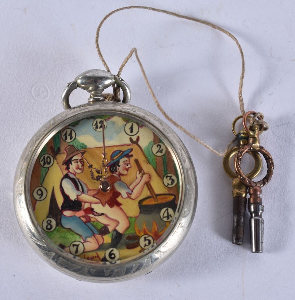 AN EROTIC 'RANDOLPH AND DONNY GO CAMPING' POCKET WATCH modelled as Randy Randolph helping Donny prep: AN EROTIC 'RANDOLPH AND DONNY GO CAMPING' POCKET WATCH modelled as Randy Randolph helping Donny prepare his famous stewed meat. Running. 4.5 cm wide.